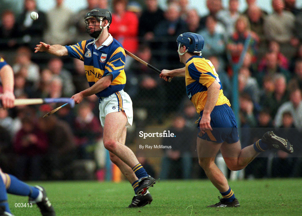 10 May 1997; Thomas Dunne of Tipperary in action against Liam Doyle of Clare during the National Hurling League Division 1 match between Clare and Tipperary at Cusack Park in Ennis. Photo by Ray McManus/Sportsfile