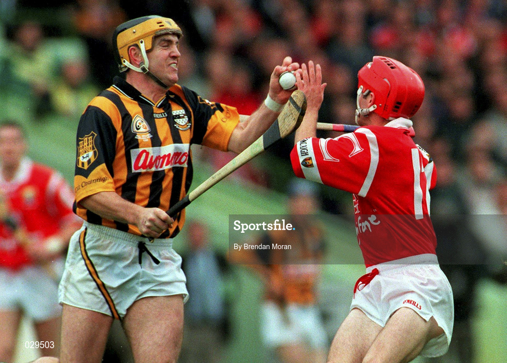 12 September 1999; Canice Brennan of Kilkenny in action against Sean McGrath of Cork during the Guinness All-Ireland Senior Hurling Championship Final between Cork and Kilkenny at Croke Park in Dublin. Photo by Brendan Moran/Sportsfile
