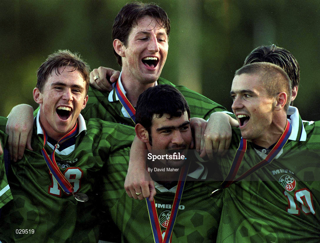 25 July 1999; Republic of Ireland players, from left, Richie Baker, Clive Delaney, back, Jason Gavin and Graham Barrett celebrate after receiving their medals following the UEFA European U18 Championship Finals Third Place Match between Greece and Republic of Ireland at Folkungavallen Stadium in Linköping, Sweden. Photo by David Maher/Sportsfile