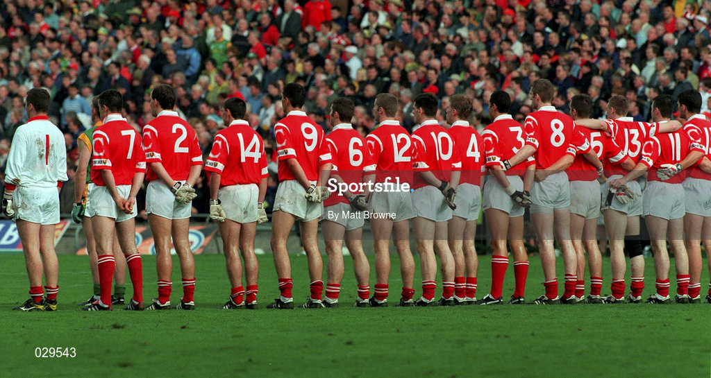 26 September 1999; The Cork team stand for the National Anthem, Amhrán na bhFiann, prior to the Bank of Ireland All-Ireland Senior Football Championship Final between Meath and Cork at Croke Park in Dublin. Photo by Matt Browne/Sportsfile