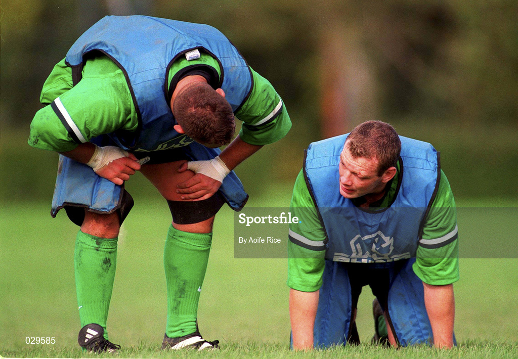 29 September 1999; Justin Fitzpatrick checks on his teammate David Corkery after he injured his eye during an Ireland Rugby training session at King's Hospital in Palmerstown, Dublin. Photo by Aoife Rice/Sportsfile