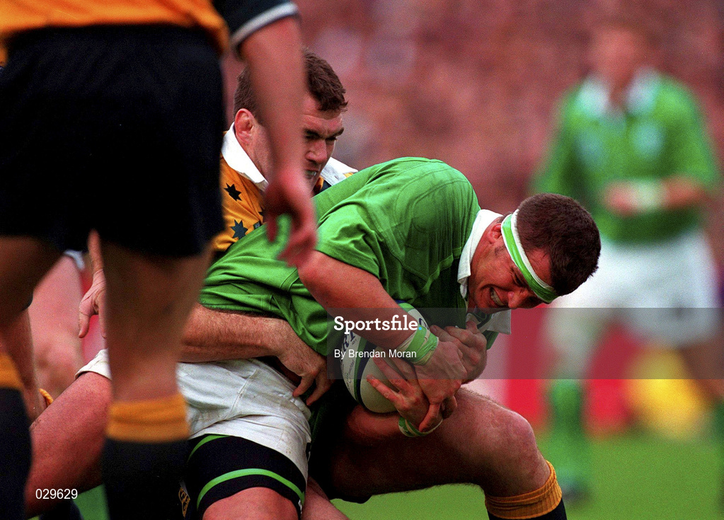 10 October 1999; Dion O'Cuinneagain of Ireland in action against Daniel Herbert of Australia during the Rugby World Cup Pool E match between Ireland and Australia at Lansdowne Road in Dublin. Photo by Brendan Moran/Sportsfile