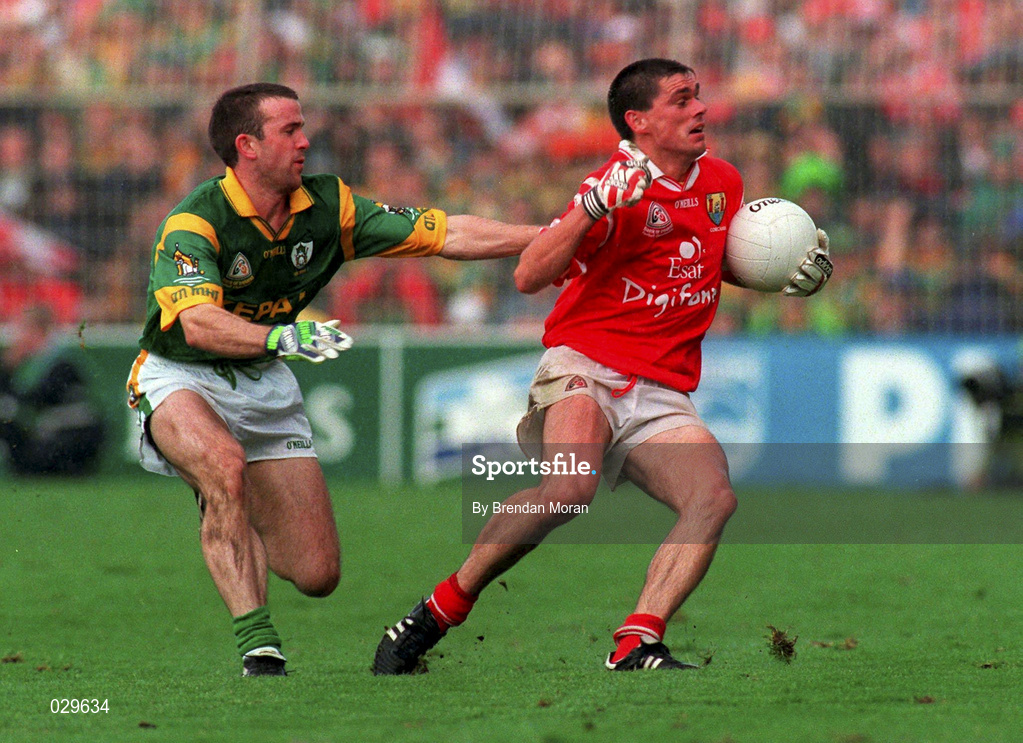26 September 1999; Don Davis of Cork in action against Evan Kelly of Meath during the Bank of Ireland All-Ireland Senior Football Championship Final match between Meath and Cork at Croke Park in Dublin. Photo by Brendan Moran/Sportsfile
