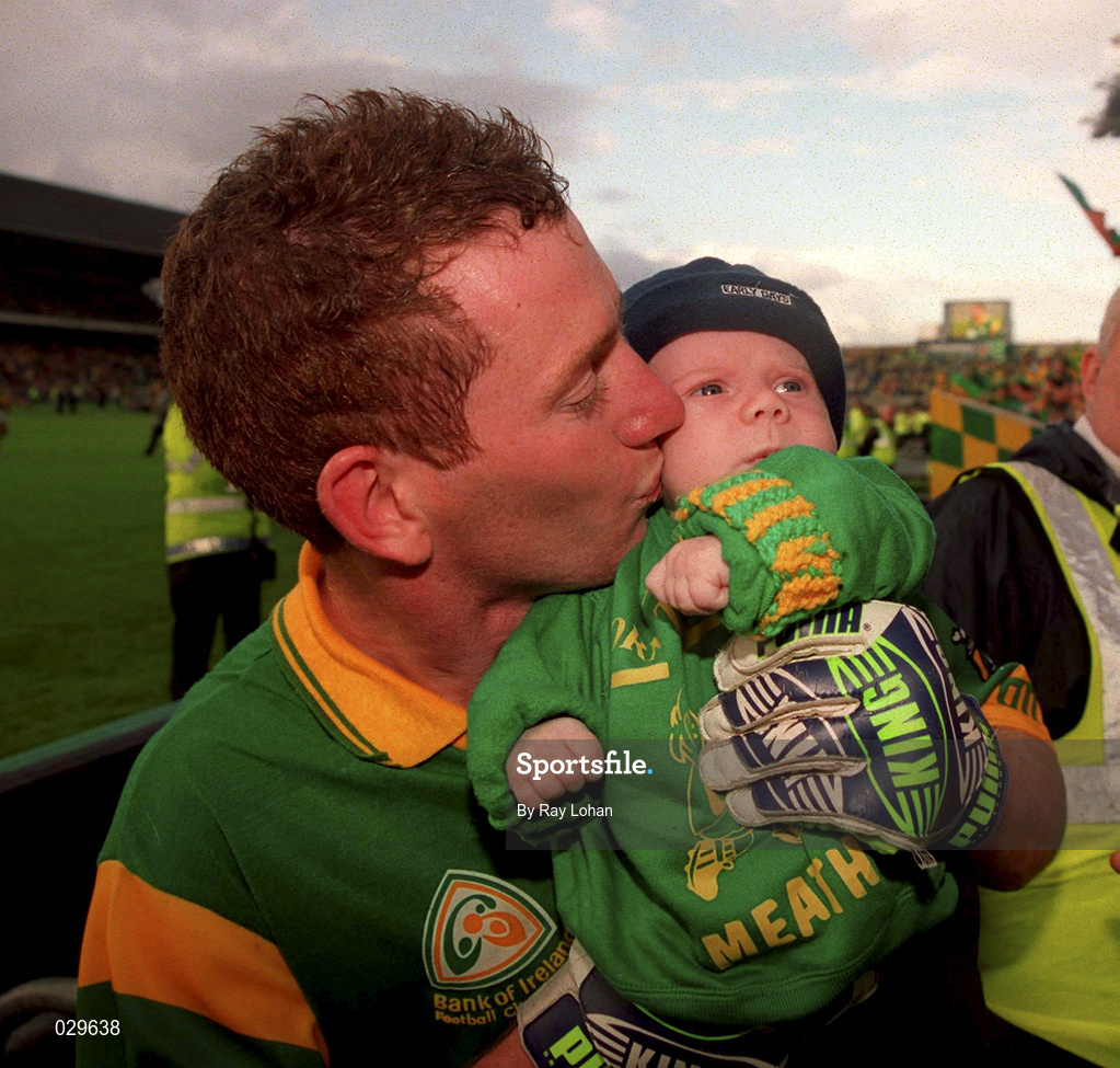26 September 1999; Donal Curtis of Meath celebrates his side's victory with his nephew following the Bank of Ireland All-Ireland Senior Football Championship Final match between Meath and Cork at Croke Park in Dublin. Photo by Ray Lohan/Sportsfile