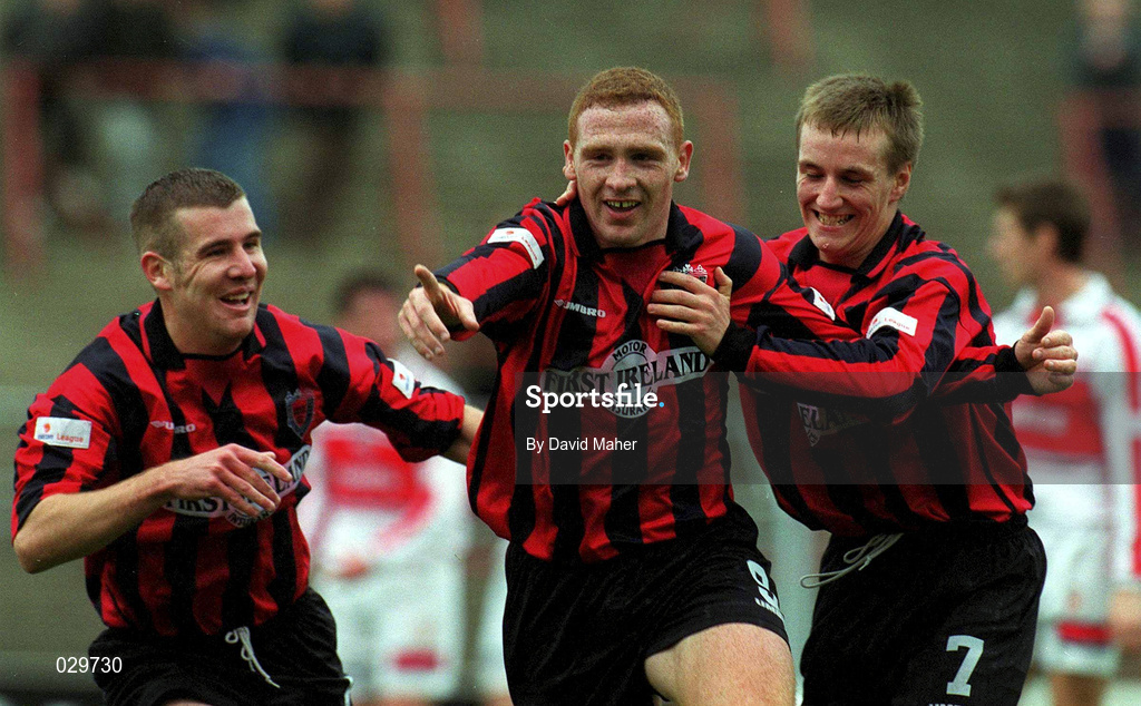 31 October 1999; Glen Crowe celebrates with his Bohemians team-mates Garreth O'Connor, right, and Stephen Caffrey, left, after scoring his side's first goal during the Eircom League Premier Division match between Bohemians and Sligo Rovers at Dalymount Park in Dublin. Photo by David Maher/Sportsfile