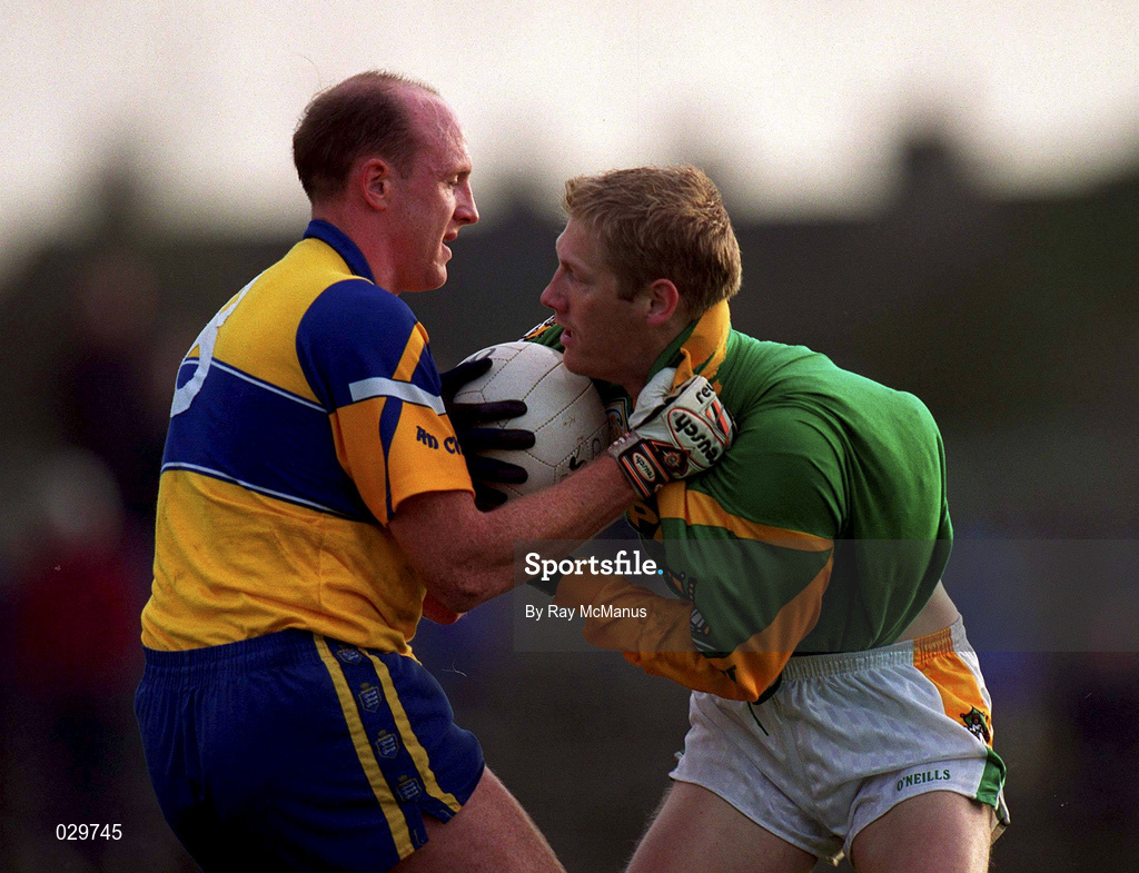 31 October 1999; Graham Geraghty of Meath is tackled by Donal O'Sullivan of Clare during the Church & General National Football League Division 1B match between Meath and Clare at Páirc Tailteann in Navan, Meath. Photo by Ray McManus/Sportsfile