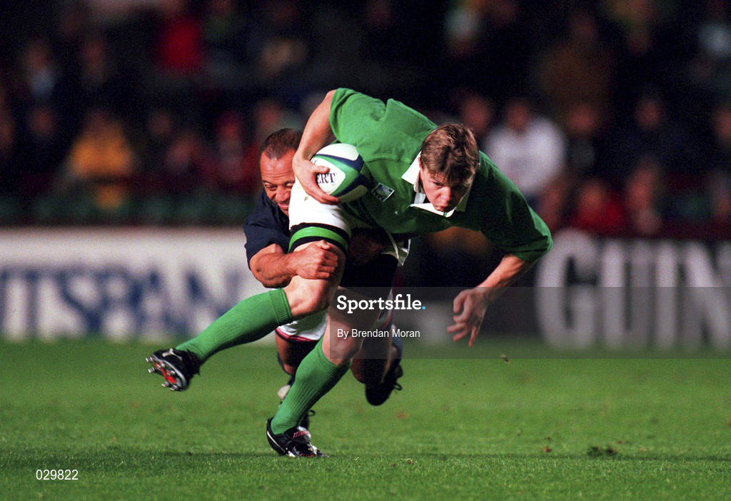 2 October 1999; Ireland's Brian O'Driscoll is tackled by David Niu of USA during the Rugby World Cup Pool E match between Ireland and USA at Lansdowne Road in Dublin. Photo by Brendan Moran/Sportsfile