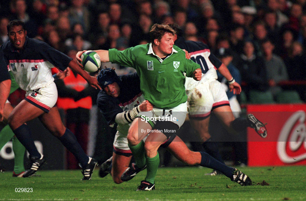 2 October 1999; Ireland's Brian O'Driscoll is tackled by Dave Hodges of USA during the Rugby World Cup Pool E match between Ireland and USA at Lansdowne Road in Dublin. Photo by Brendan Moran/Sportsfile