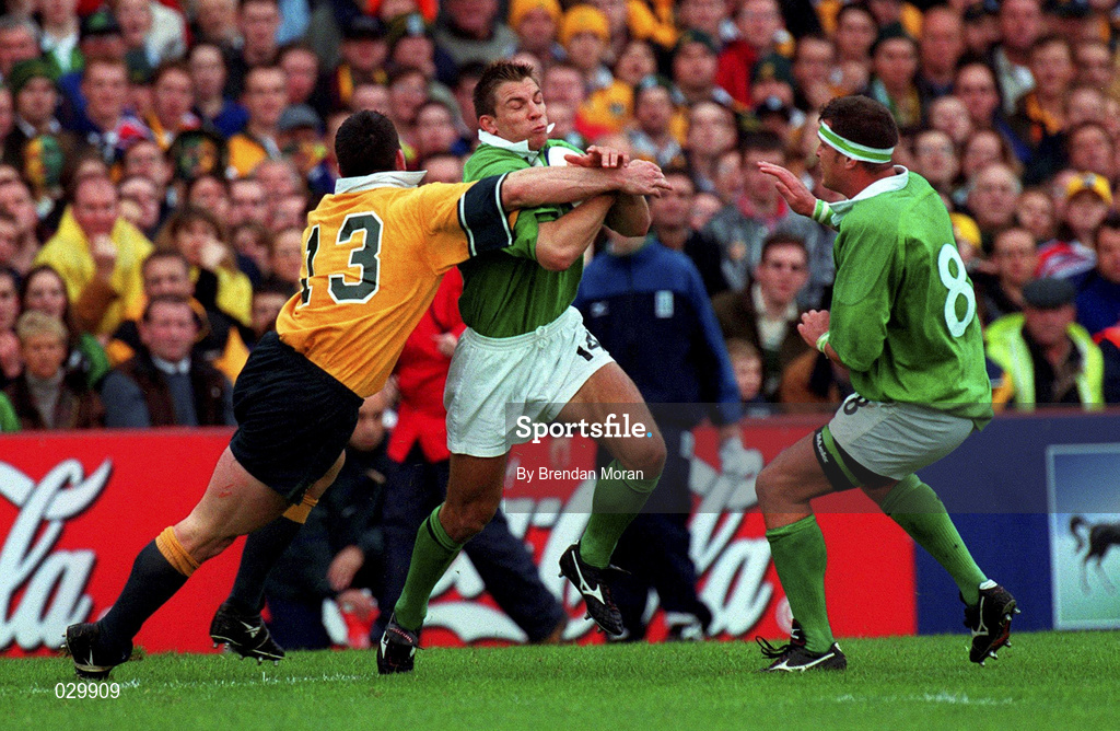 10 October 1999; Justin Bishop of Ireland in action against Daniel Herbert of Australia during the Rugby World Cup Pool E match between Ireland and Australia at Lansdowne Road in Dublin. Photo by Brendan Moran/Sportsfile