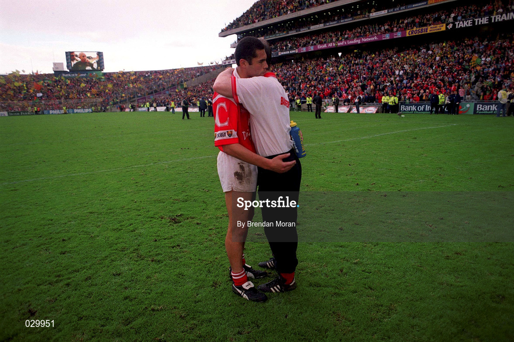 26 September 1999; Cork manager Larry Tompkins consoles Seán Óg Ó hAilpín after the Bank of Ireland All-Ireland Senior Football Championship Final match between Meath and Cork at Croke Park in Dublin. Photo by Brendan Moran/Sportsfile