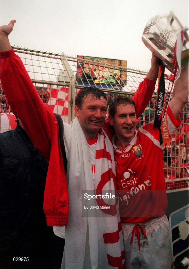 12 September 1999; Cork manager Jimmy Barry Murphy, left, and captain Mark Landers celebrate with the Liam MacCarthy Cup following the Guinness All-Ireland Senior Hurling Championship Final between Cork and Kilkenny at Croke Park in Dublin. Photo by David Maher/Sportsfile