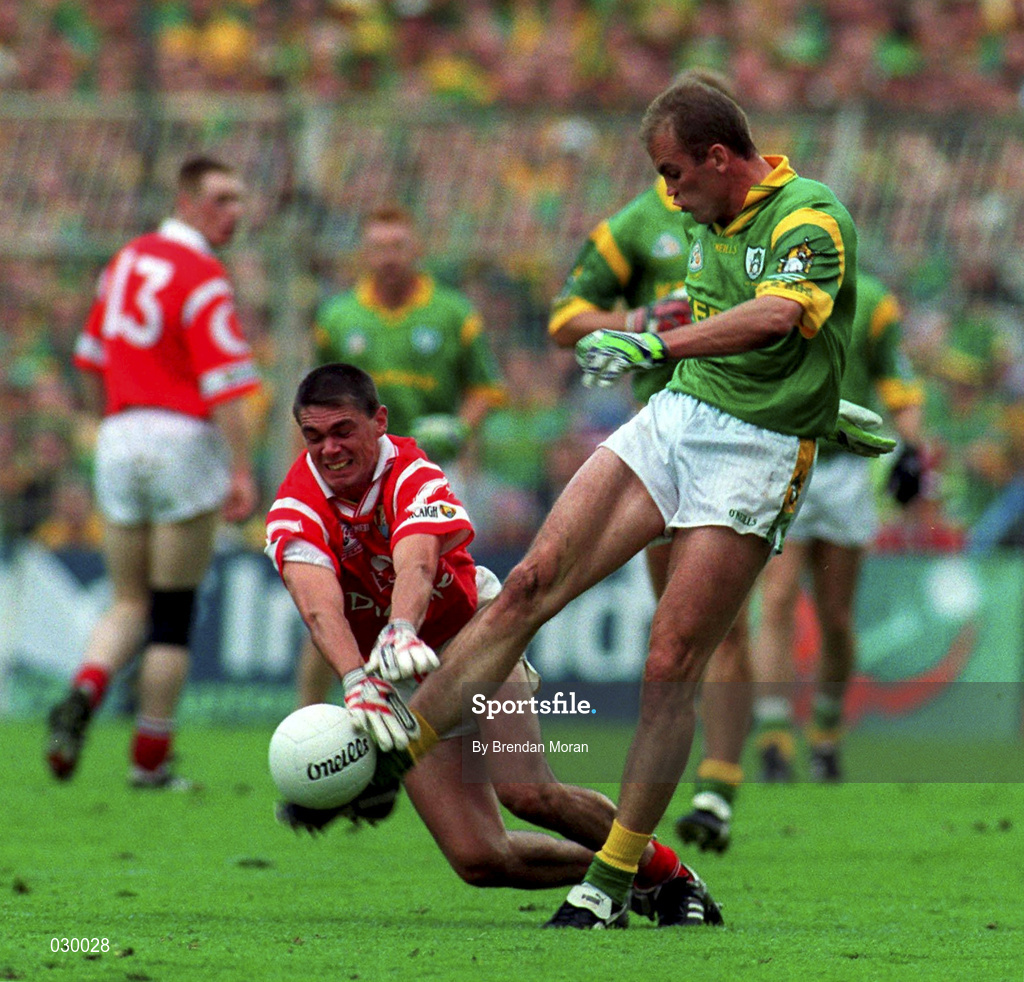 26 September 1999; John McDermott of Meath in action against Don Davis of Cork during the Bank of Ireland All-Ireland Senior Football Championship Final match between Meath and Cork at Croke Park in Dublin. Photo by Brendan Moran/Sportsfile