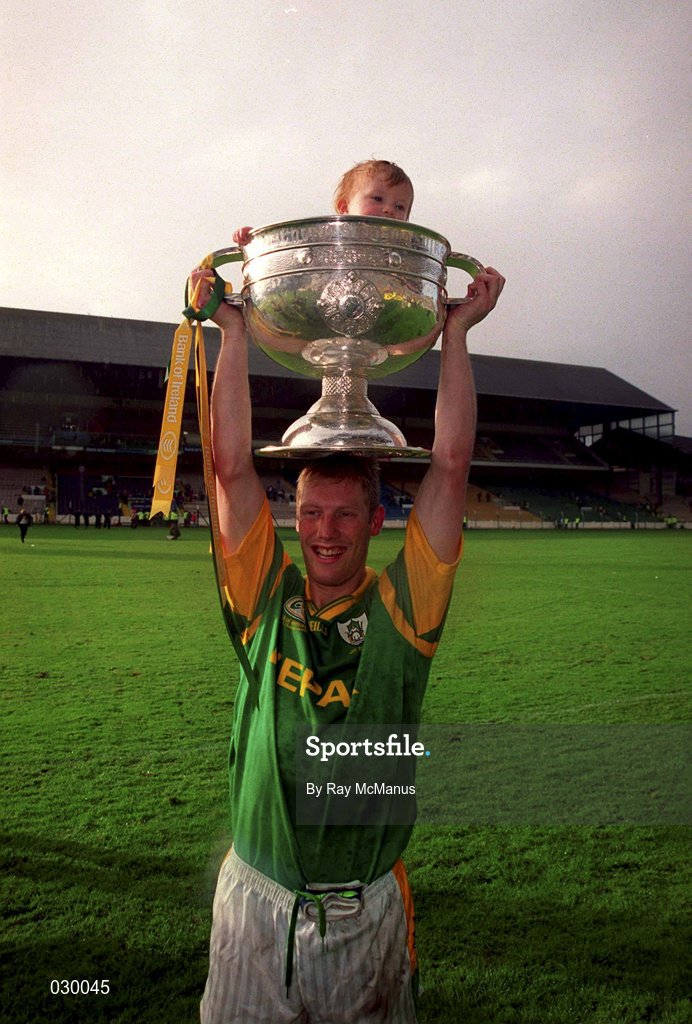 26 September 1999; Meath Captain Graham Geraghty celebrates with his daughter Sophia and the Sam Maguire Cup following the Bank of Ireland All-Ireland Senior Football Championship Final match between Meath amd Cork at Croke Park in Dublin. Photo by Ray McManus/Sportsfile