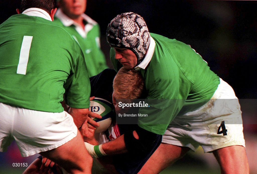 2 October 1999; Paddy Johns, 4, and Peter Clohessy of Ireland combine to stop USA scrum half Kevin Dalzell advancing during the Rugby World Cup Pool E match between Ireland and USA at Lansdowne Road in Dublin. Photo by Brendan Moran/Sportsfile