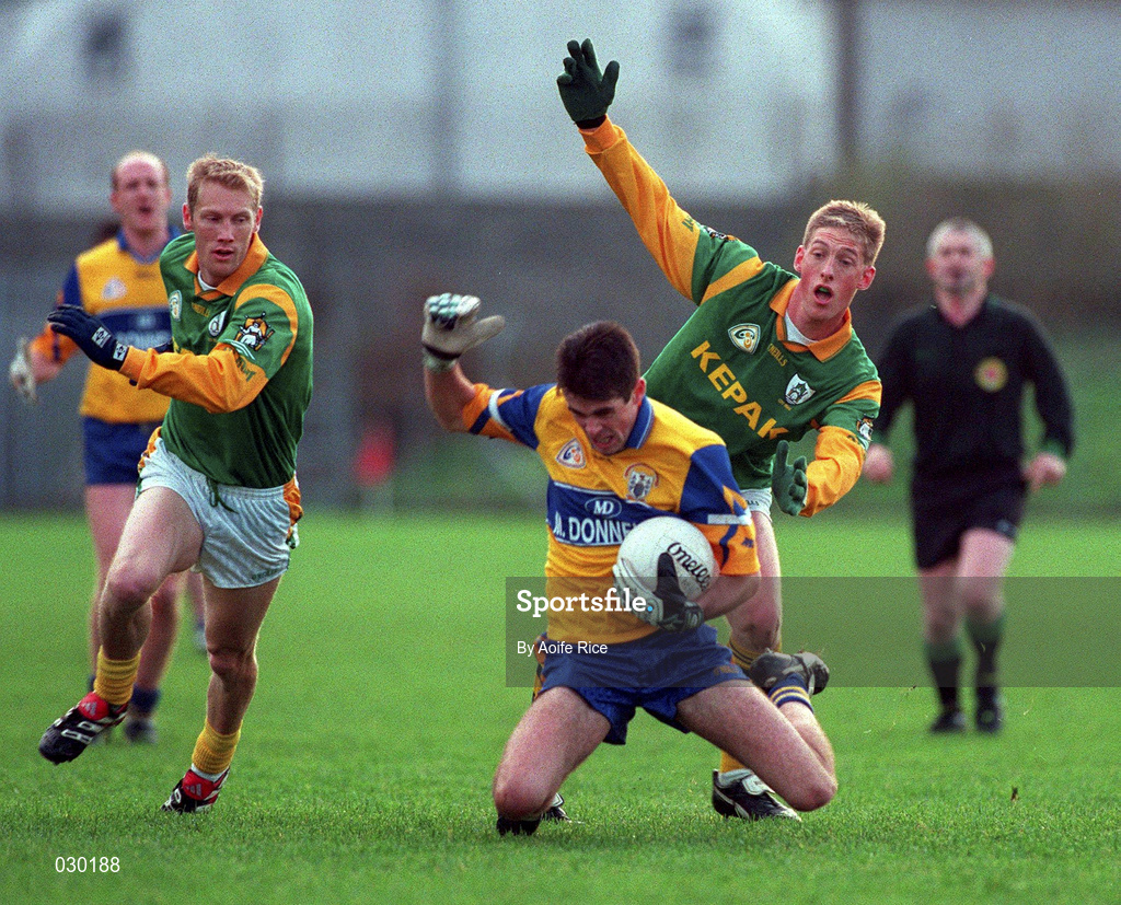 31 October 1999; Peadar McMahon of Clare in action against Trevor Giles with the support of his Meath team-mate Graham Geraghty, left, during the Church & General National Football League Division 1B match between Meath and Clare at Páirc Tailteann in Navan, Meath. Photo by Aoife Rice/Sportsfile