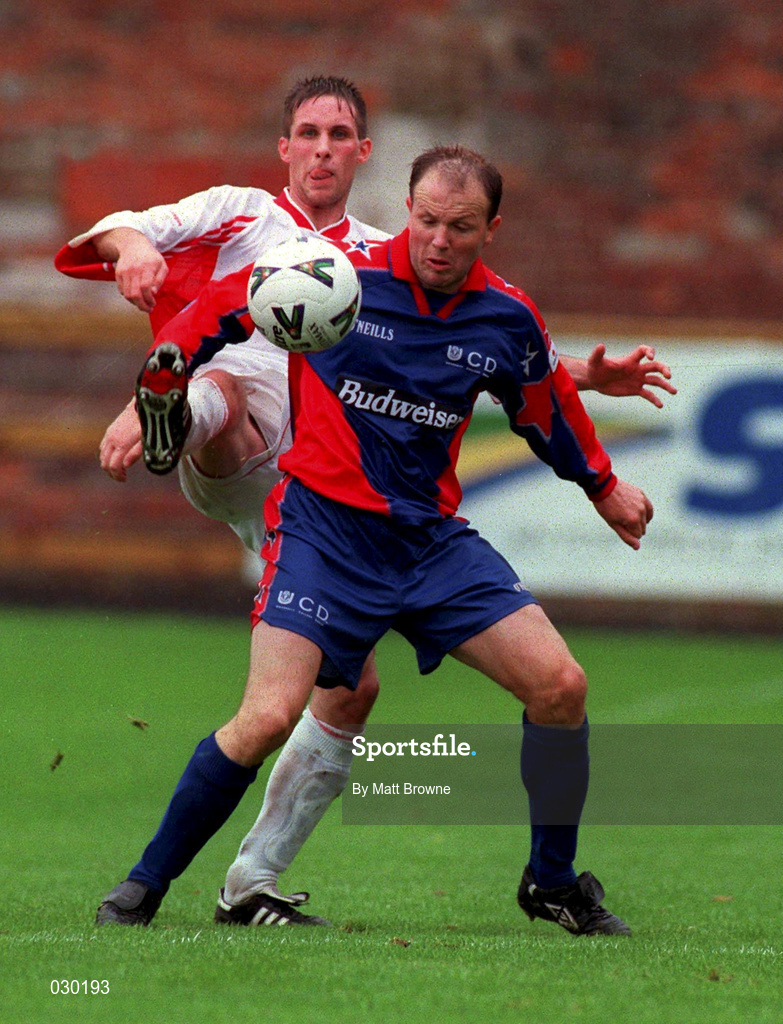12 September 1999; Peter Hanrahan of UCD in action against Billy Clery of Galway United during the Eircom League Premier Division match between UCD and Galway United at Belfield Park in Dublin. Photo by Matt Browne/Sportsfile