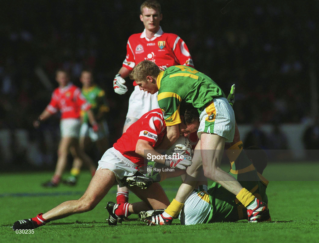 26 September 1999; Ronan McCarthy of Cork in action against Graham Geraghty of Meath during the Bank of Ireland All-Ireland Senior Football Championship Final between Meath and Cork at Croke Park in Dublin. Photo by Ray Lohan/Sportsfile