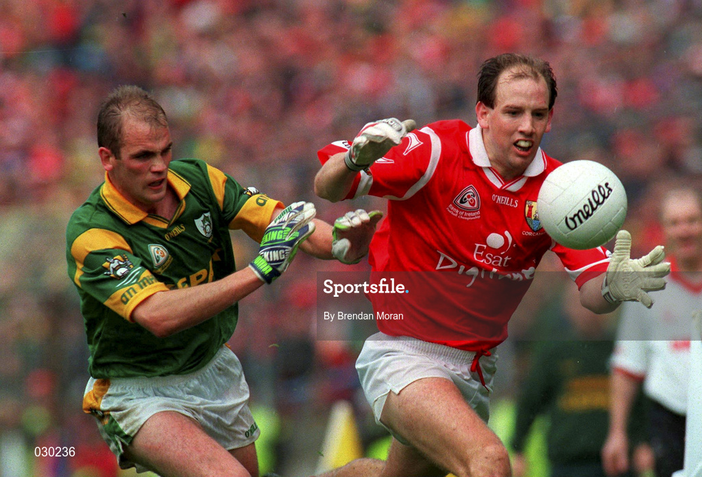 26 September 1999; Ronan McCarthy of Cork in action against John McDermott of Meath during the Bank of Ireland All-Ireland Senior Football Championship Final between Meath and Cork at Croke Park, Dublin. Photo by Brendan Moran/Sportsfile