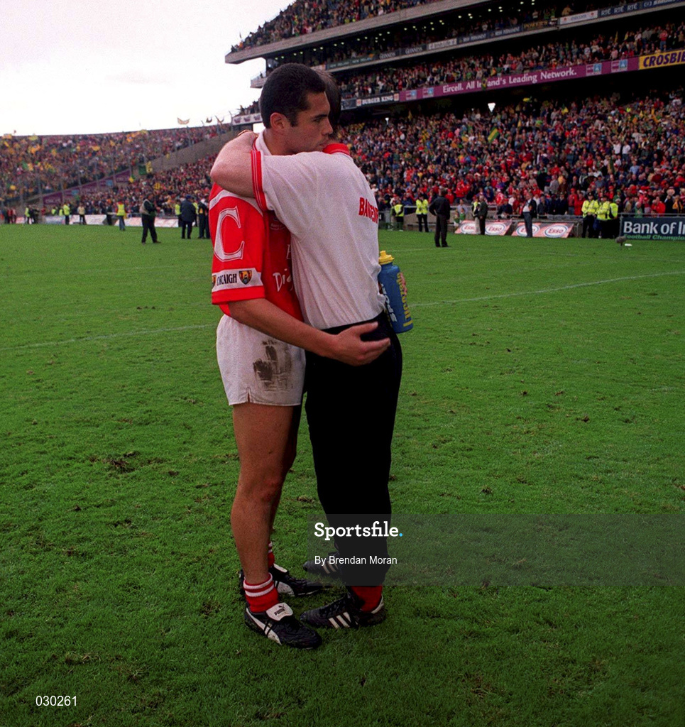 26 September 1999; Cork manager Larry Tompkins consoles Seán Óg Ó hAilpín after the Bank of Ireland All-Ireland Senior Football Championship Final match between Meath and Cork at Croke Park in Dublin. Photo by Brendan Moran/Sportsfile