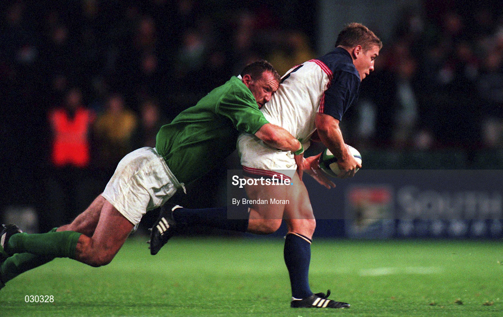 2 October 1999; Trevor Brennan of Ireland tackles Dan Lyle of USA during the Rugby World Cup Pool E match between Ireland and USA at Lansdowne Road in Dublin. Photo by Brendan Moran/Sportsfile