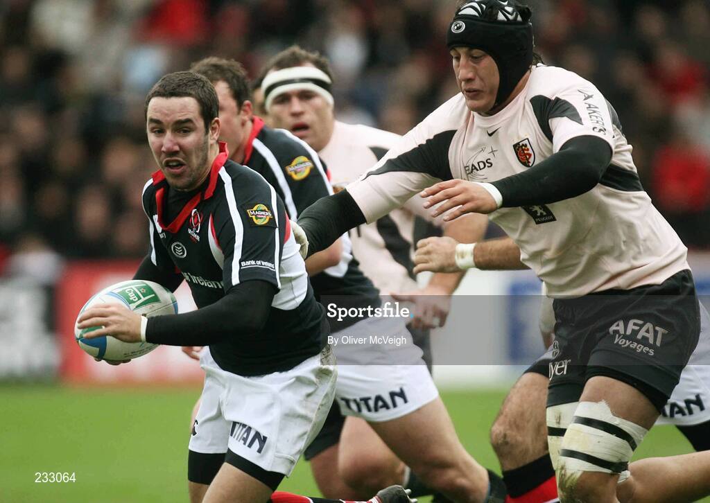 21 January 2007; Paddy Wallace, Ulster, is tackled by Patrico Albacete, Toulouse. Heineken Cup, Pool 5, Round 6, Toulouse v Ulster, Stade Ernest Wallon, Toulouse, France. Picture credit: Oliver McVeigh / SPORTSFILE