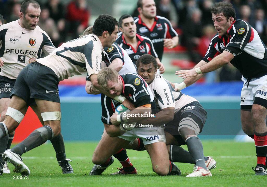 21 January 2007; Roger Wilson, Ulster, is tackled by Gregory Lamboley and Yannick Nyanga, Toulouse. Heineken Cup, Pool 5, Round 6, Toulouse v Ulster, Stade Ernest Wallon, Toulouse, France. Picture credit: Oliver McVeigh / SPORTSFILE