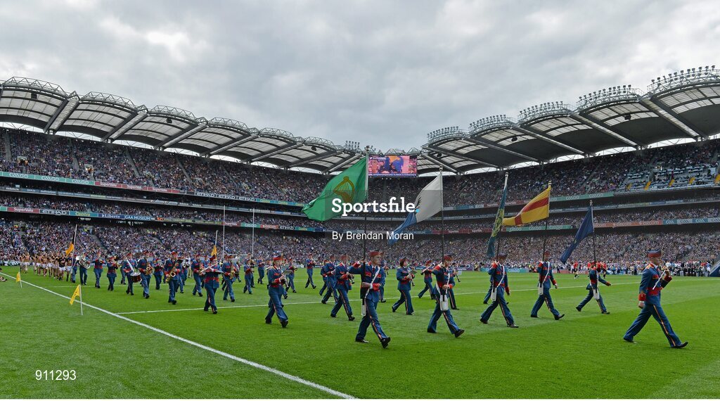 7 September 2014; The Kilkenny and Tipperary teams walk behind the Artand band during the pre-match parade. GAA Hurling All Ireland Senior Championship Final, Kilkenny v Tipperary. Croke Park, Dublin. Picture credit: Brendan Moran / SPORTSFILE