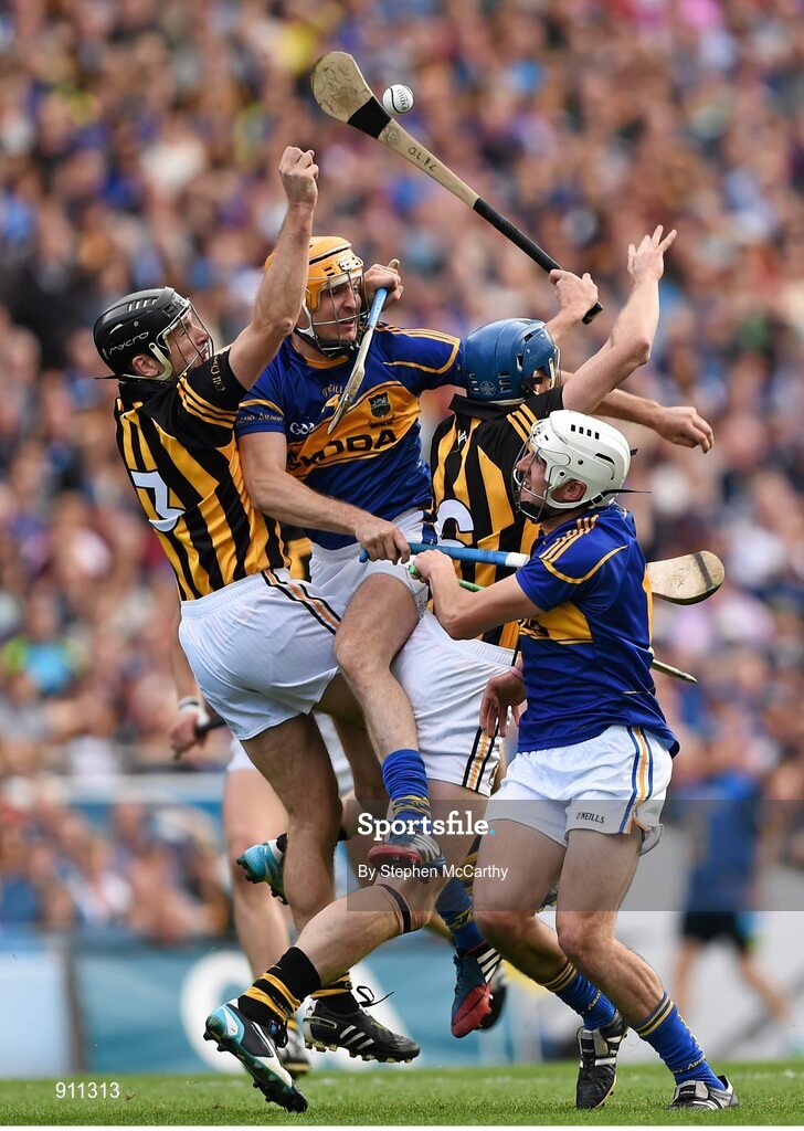 7 September 2014; JJ Delaney, left, and Brian Hogan, Kilkenny, in action against Seamus Callanan, left, and Patrick Maher, Tipperary. GAA Hurling All Ireland Senior Championship Final, Kilkenny v Tipperary. Croke Park, Dublin. Picture credit: Stephen McCarthy / SPORTSFILE