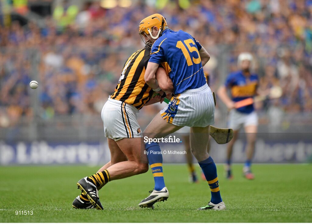 7 September 2014; Lar Corbett, Tipperary, in action against Jackie Tyrrell, Kilkenny. GAA Hurling All Ireland Senior Championship Final, Kilkenny v Tipperary. Croke Park, Dublin. Picture credit: Piaras Ó Mídheach / SPORTSFILE
