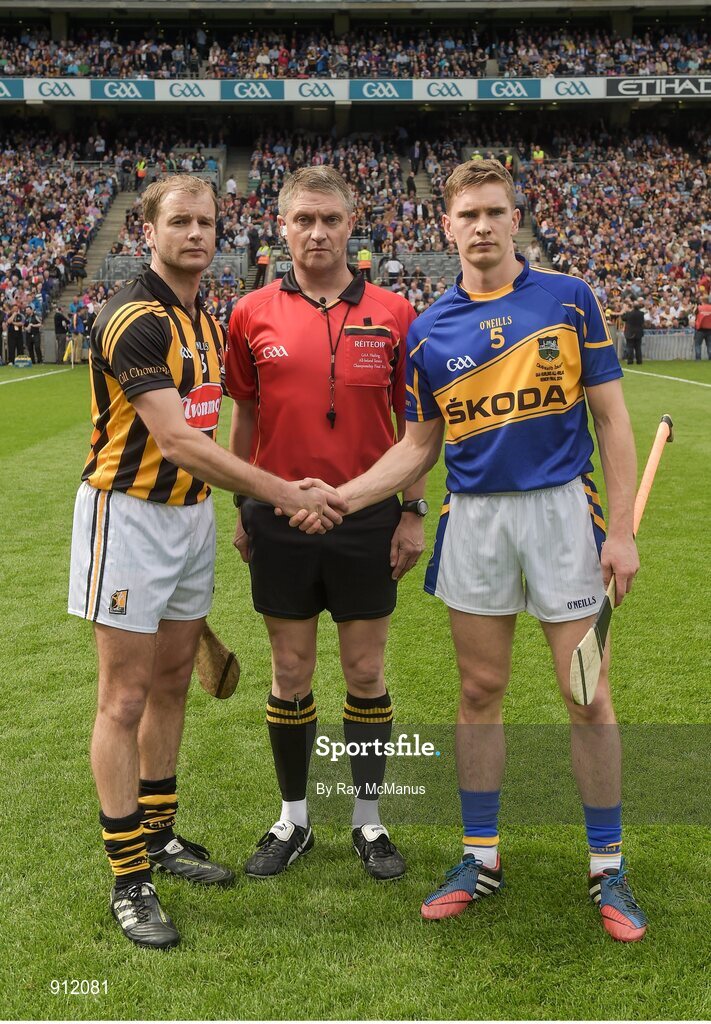 7 September 2014; Tipperary captain Brendan Maher and Kilkenny captain JJ Delaney shake hands before the game, with referee Barry Kelly. GAA Hurling All Ireland Senior Championship Final, Kilkenny v Tipperary. Croke Park, Dublin. Picture credit: Ray McManus