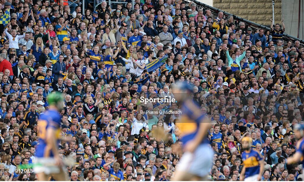 7 September 2014; Tipperary supporters cheer on their side from the Hogan Stand during the game. GAA Hurling All Ireland Senior Championship Final, Kilkenny v Tipperary. Croke Park, Dublin. Picture credit: Piaras Ó Mídheach / SPORTSFILE