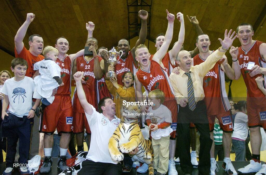 28 January 2007; The Abrakebabra Tigers team celebrate with the cup after the game. Men's Superleague National Cup Final, Abrakebabra Tigers, Tralee, Co. Kerry v UCC Demons, Cork, National Basketball Arena, Tallaght, Dublin. Picture credit: Brendan Moran / SPORTSFILE