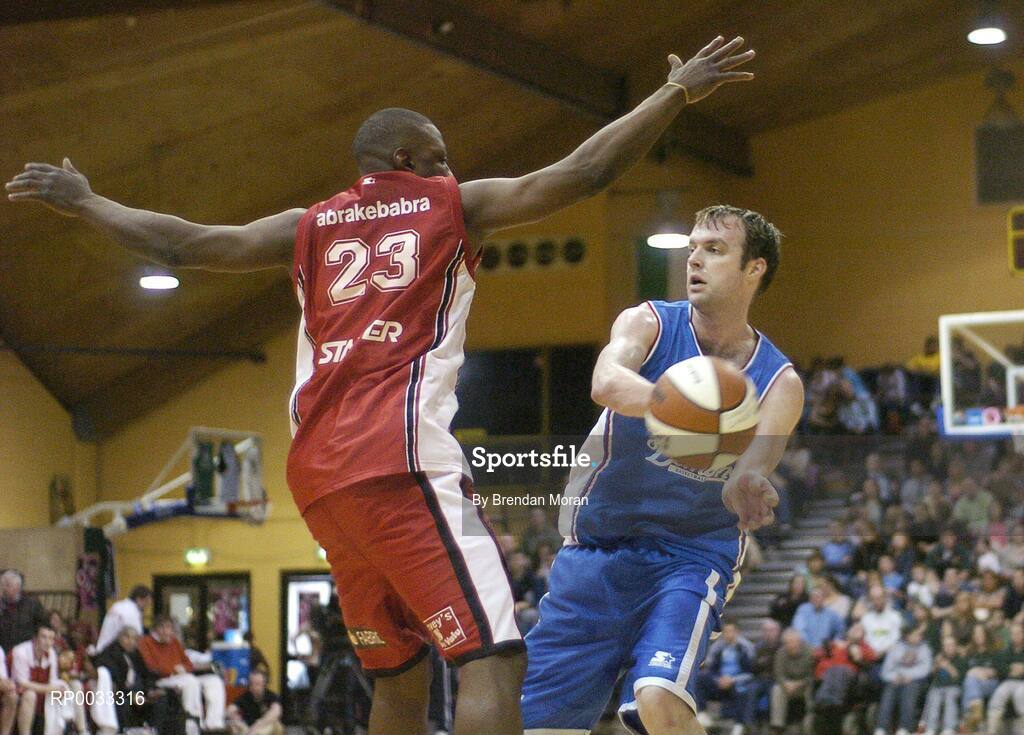 28 January 2007; Tim O'Halloran, UCC Demons, in action against Roscoe Patterson, Abrakebabra Tigers. Men's Superleague National Cup Final, Abrakebabra Tigers, Tralee, Co. Kerry v UCC Demons, Cork, National Basketball Arena, Tallaght, Dublin. Picture credit: Brendan Moran / SPORTSFILE