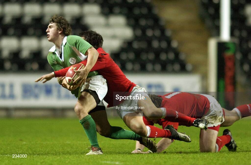2 February 2007; Ian Keatley, Ireland, is tackled by Robert Lewis, Wales. U20 Six Nations Rugby Championship, Wales v Ireland, Liberty Stadium, Swansea, Wales. Picture credit: Brendan Moran / SPORTSFILE