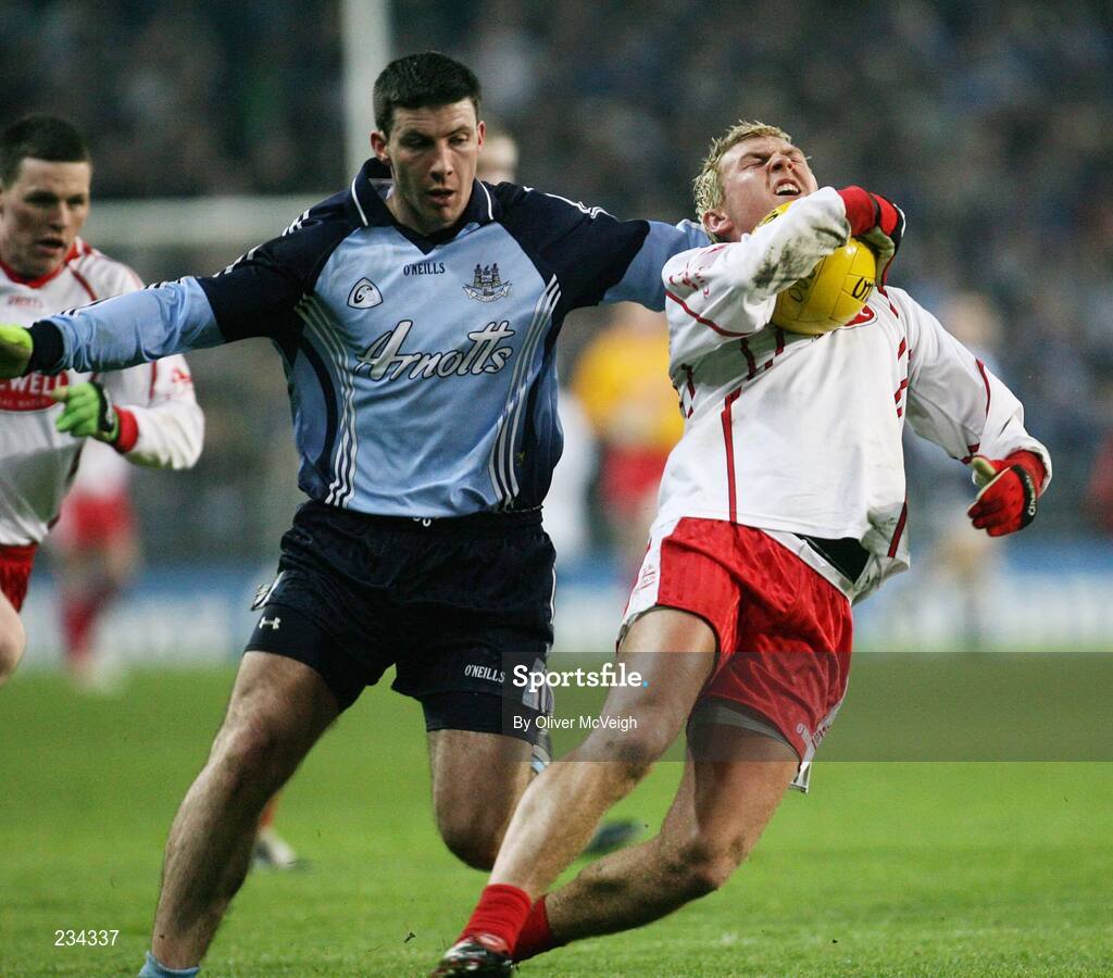 3 February 2007; Colin Moran, Dublin, tackles Owen Mulligan, Tyrone. Allianz NFL Division 1A, Dublin v Tyrone, Croke Park, Dublin. Picture credit: Oliver McVeigh / SPORTSFILE