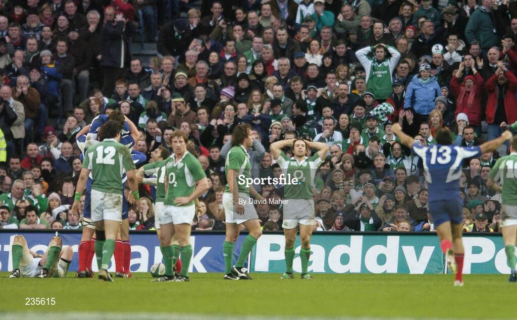 11 February 2007; Dejected Ireland players and supporters after Vincent Clerc, France, hidden, had scored his side's winning try. RBS Six Nations Rugby Championship, Ireland v France, Croke Park, Dublin. Picture Credit: David Maher / SPORTSFILE