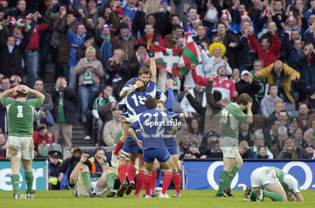 11 February 2007; Vincent Clerc, France, celebrates his try against Ireland with team-mate JeromeThion, 18, as dejected Ireland players Marcus Horan,1, Paul O'Connell, Gordon D'Arcy, 13, and Denis Hickie despair. RBS Six Nations Rugby Championship, Ireland v France, Croke Park, Dublin. Picture Credit: Matt Browne / SPORTSFILE