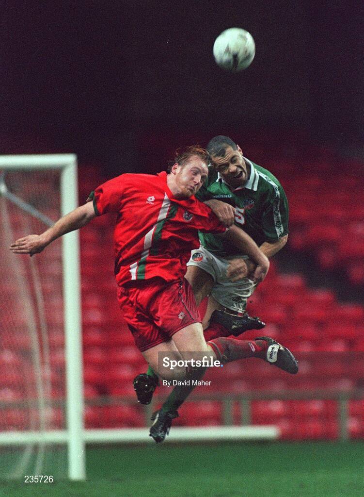 11 February 1997; Paul McGrath, Republic of Ireland, in action against John Hartson, Wales. International Friendly, Wales v Republic of Ireland, Cardiff Arms Park, Cardiff, Wales. Picture credit; David Maher / SPORTSFILE