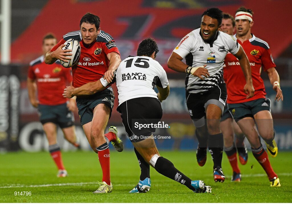 19 September 2014; Felix Jones, Munster, is tackled by Hennie Daniller, Zebre. Guinness PRO12  Round 3, Munster v Zebre. Thomond Park, Limerick. Picture credit: Diarmuid Greene / SPORTSFILE
