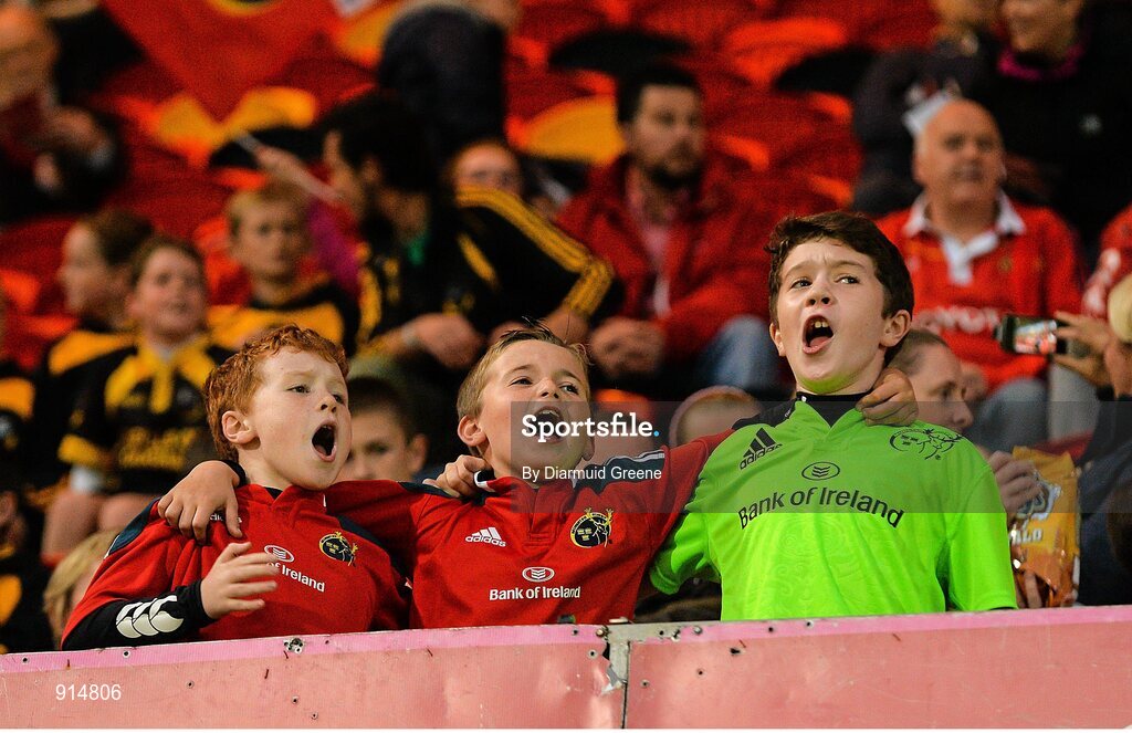19 September 2014; Three young Munster supporters sing along to "Stand Up and Fight" before the game. Guinness PRO12, Round 3,  Munster v Zebre. Thomond Park, Limerick. Picture credit: Diarmuid Greene / SPORTSFILE