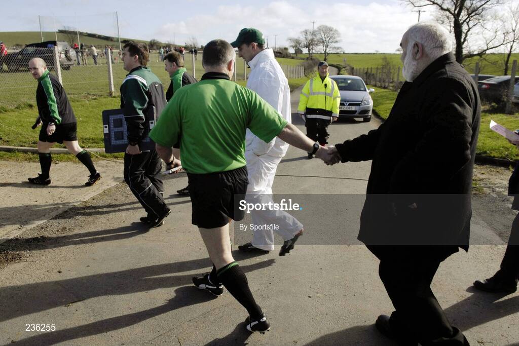 18 February 2007; A supporter has a handshake with the referee Gerard Devlin before the start of the game. Allianz National Hurling League Division 1A, Round 1, Down v Clare, Portaferry, Down. Photo by Sportsfile *** Local Caption ***
