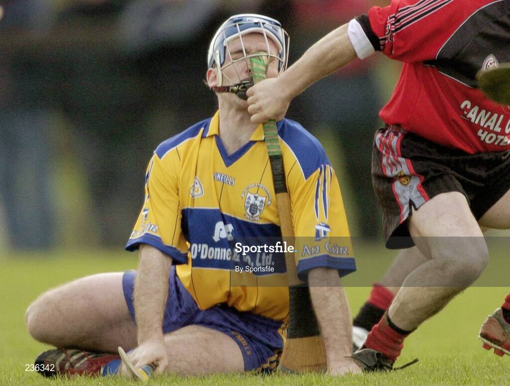 18 February 2007; Clare's Gerry Quinn feels the force of a Down hurley through his helmet. Allianz National Hurling League Division 1A, Round 1, Down v Clare, Portaferry, Down. Photo by Sportsfile *** Local Caption ***