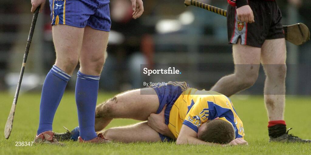 18 February 2007; Clare's Declan O'Rourke lies in pain after an incident. Allianz National Hurling League Division 1A, Round 1, Down v Clare, Portaferry, Down. Photo by Sportsfile *** Local Caption ***
