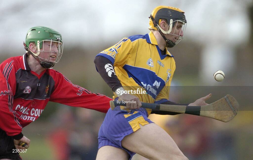 18 February 2007; Tony Griffen, Clare, in action against Paddy Hughes, Down. Allianz National Hurling League Division 1A, Round 1, Down v Clare, Portaferry, Down. Photo by Sportsfile *** Local Caption ***