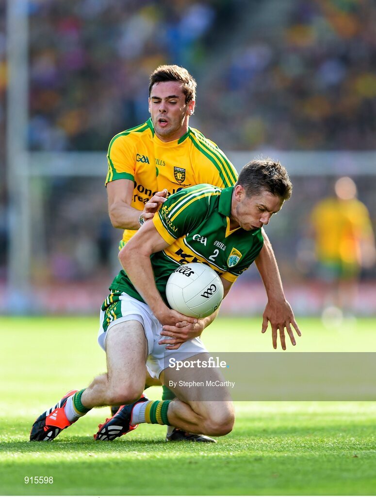 21 September 2014; Marc Ó Sé, Kerry, in action against Odhrán Mac Niallais, Donegal. GAA Football All Ireland Senior Championship Final, Kerry v Donegal. Croke Park, Dublin. Picture credit: Stephen McCarthy / SPORTSFILE