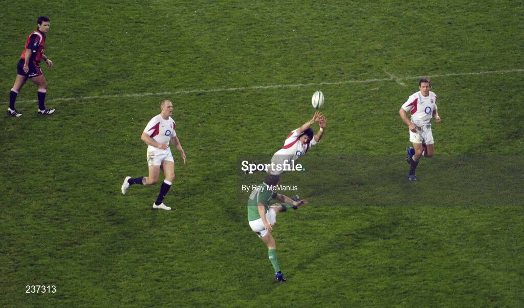 24 February 2007; Ronan O'Gara, Ireland, clears under pressure from England scrum-half Harry Ellis supported by team-mates Mike Tindall and Jonny Wilkinson. RBS Six Nations Rugby Championship, Ireland v England, Croke Park, Dublin. Picture Credit: Ray McManus / SPORTSFILE