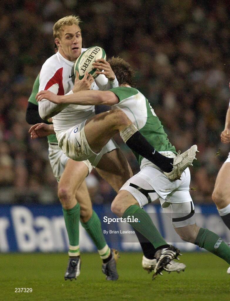 24 February 2007; England's Olly Morgan is tackled by Ireland's Brian O'Driscoll. RBS Six Nations Rugby Championship, Ireland v England, Croke Park, Dublin. Picture Credit: Brian Lawless / SPORTSFILE