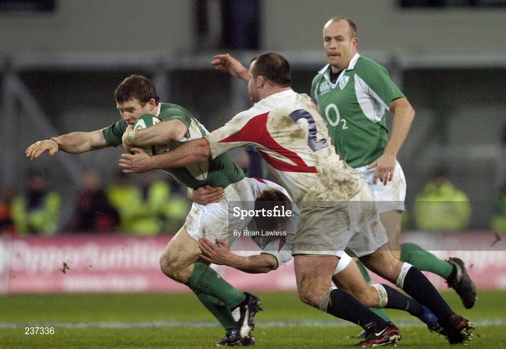 24 February 2007; Ireland's Gordon D'Arcy is tackled by Englands Jonny Wilkinson and George Chuter, right.RBS Six Nations Rugby Championship, Ireland v England, Croke Park, Dublin. Picture Credit: Brian Lawless / SPORTSFILE