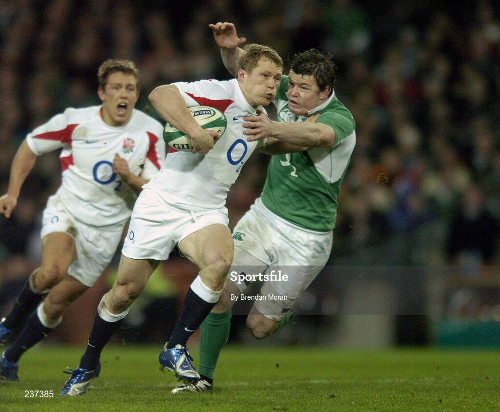 24 February 2007; Josh Lewsey, England, holds off the tackle of Brian O'Driscoll, Ireland. RBS Six Nations Rugby Championship, Ireland v England, Croke Park, Dublin. Picture Credit: Brendan Moran / SPORTSFILE