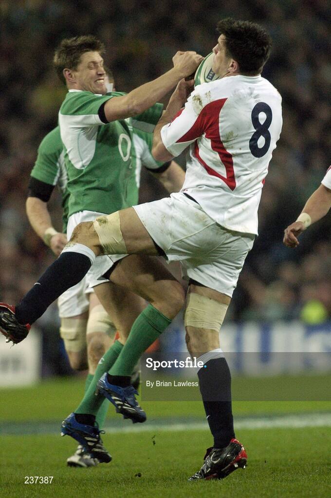 24 February 2007; Ronan O'Gara, Ireland, tackles Martin Corry, England. RBS Six Nations Rugby Championship, Ireland v England, Croke Park, Dublin. Picture Credit: Brian Lawless / SPORTSFILE